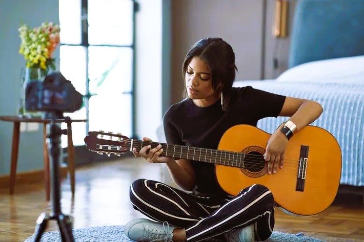 Girl playing guitar